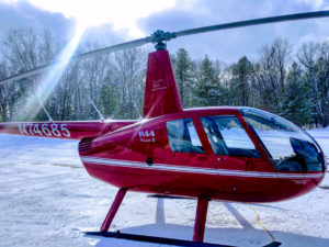 Helicopter ready to fly after a winter snowstorm